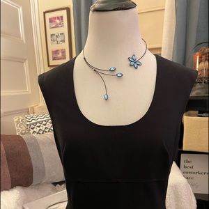 Sleeveless scoop neck dress.